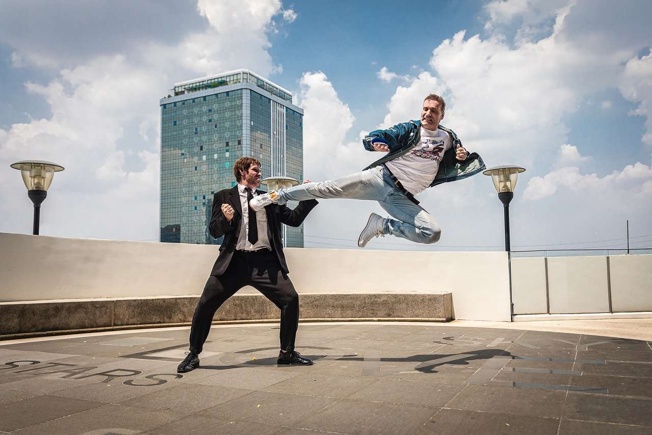 Two men - Kung fu fighting - in normal dress